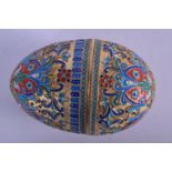 A CONTINENTAL SILVER AND ENAMEL EGG SHAPED BOX. 9cm x 6cm, weight 131g