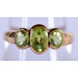 A 9CT GOLD AND PERIDOT RING. Size P, weight 2.67g
