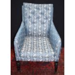 A Howard and sons style upholstered armchair 97 x 72 x 67 cm.