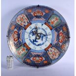 A VERY LARGE 19TH CENTURY JAPANESE MEIJI PERIOD IMARI CHARGER CLOCK with highly unusual serpent hand