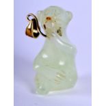 A JADE PENDANTIN THE FORM OF A MONKEY. Size 2.6cm long, weight 6.53g