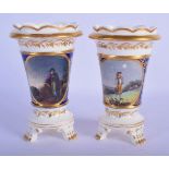 Mid 19th c. English porcelain pair of three footed vases each painted with a figure in a moonlight l