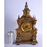 A 19TH CENTURY FRENCH BRONZE CHAMPLEVE ENAMEL MANTEL CLOCK overlaid with foliage and decorated with