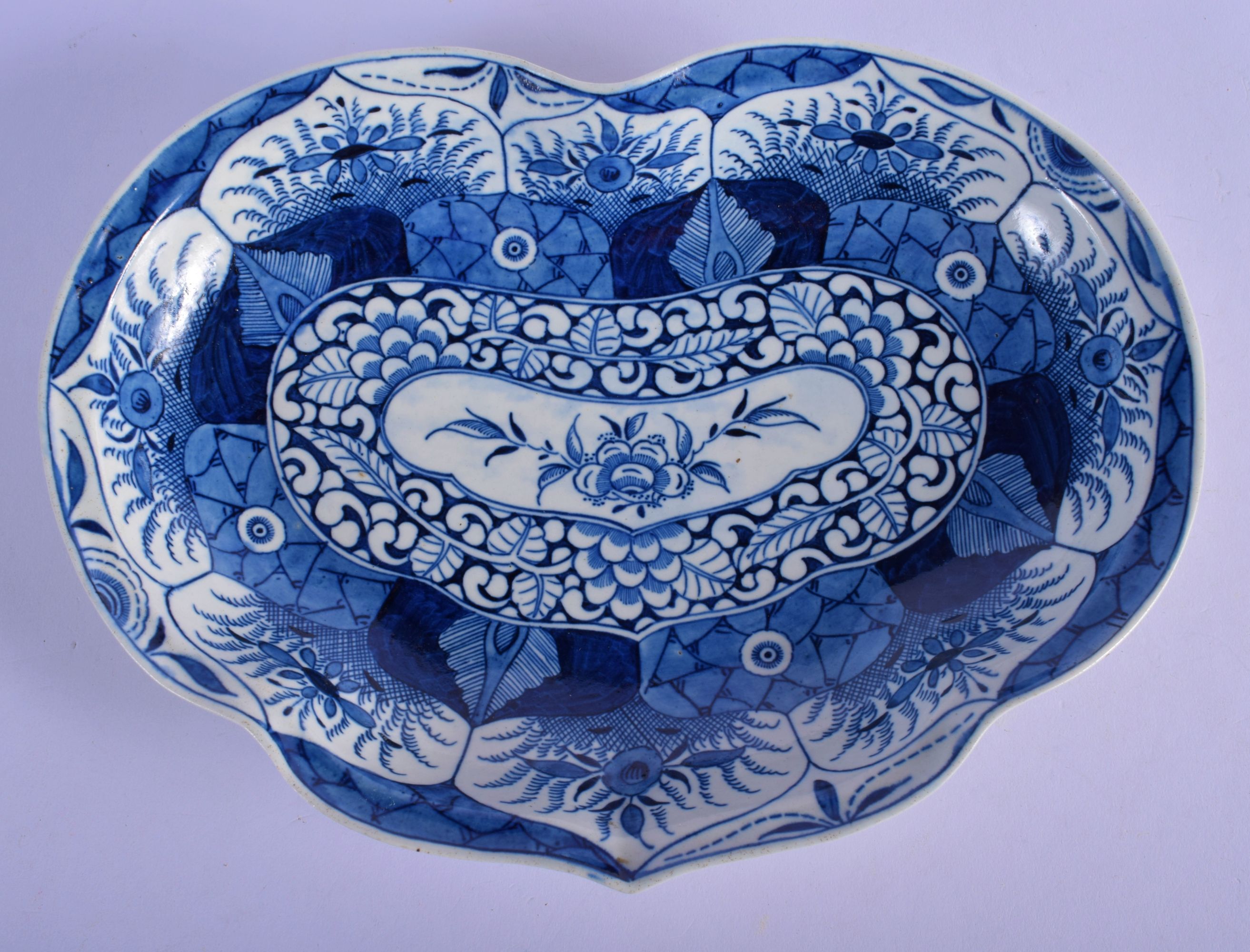 Worcester kidney-shaped dish decorated with the K'ang Hsi Lotus pattern with petal-shaped panels of