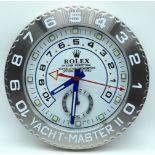 A contemporary Rolex dealership clock 34cm