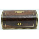 A stunning early 19th Century rosewood box with campaign brass handles and decoration 10.5 x 23cm.