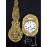 A French enamelled metal clock with pendulum and bracket 181cm x 36 cm. (2)