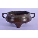 A CHINESE BRONZE CENSER. 10cm wide (incl handles), 4cm high, weight 285g