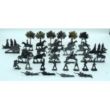 A collection of lead soldiers, boats, cannons etc