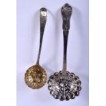 TWO ANTIQUE SILVER SIFTING SPOONS. 91 cm long. Largest 20 cm long. (2)