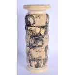 A 19TH CENTURY JAPANESE MEIJI PERIOD CARVED IVORY VASE decorated with apes in various pursuits besid