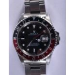 A BOXED ROLEX GMT-MASTER II COKE WRISTWATCH with paperwork and tag. 119 grams. 4.25 cm inc crown.