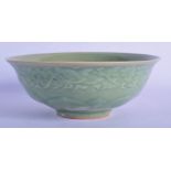 AN 18TH/19TH CENTURY CHINESE CELADON MOULDED BOWL Qing, moulded with foliage. 17.5 cm wide.