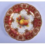 Royal Worcester fine plate with elaborate crimson and raised gilt border painted with fruit byA. Shu