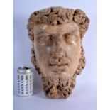 A PAINTED GRAND TOUR STYLE PLASTER BUST OF A MALE After the Antiquity. 35 cm x 25 cm.