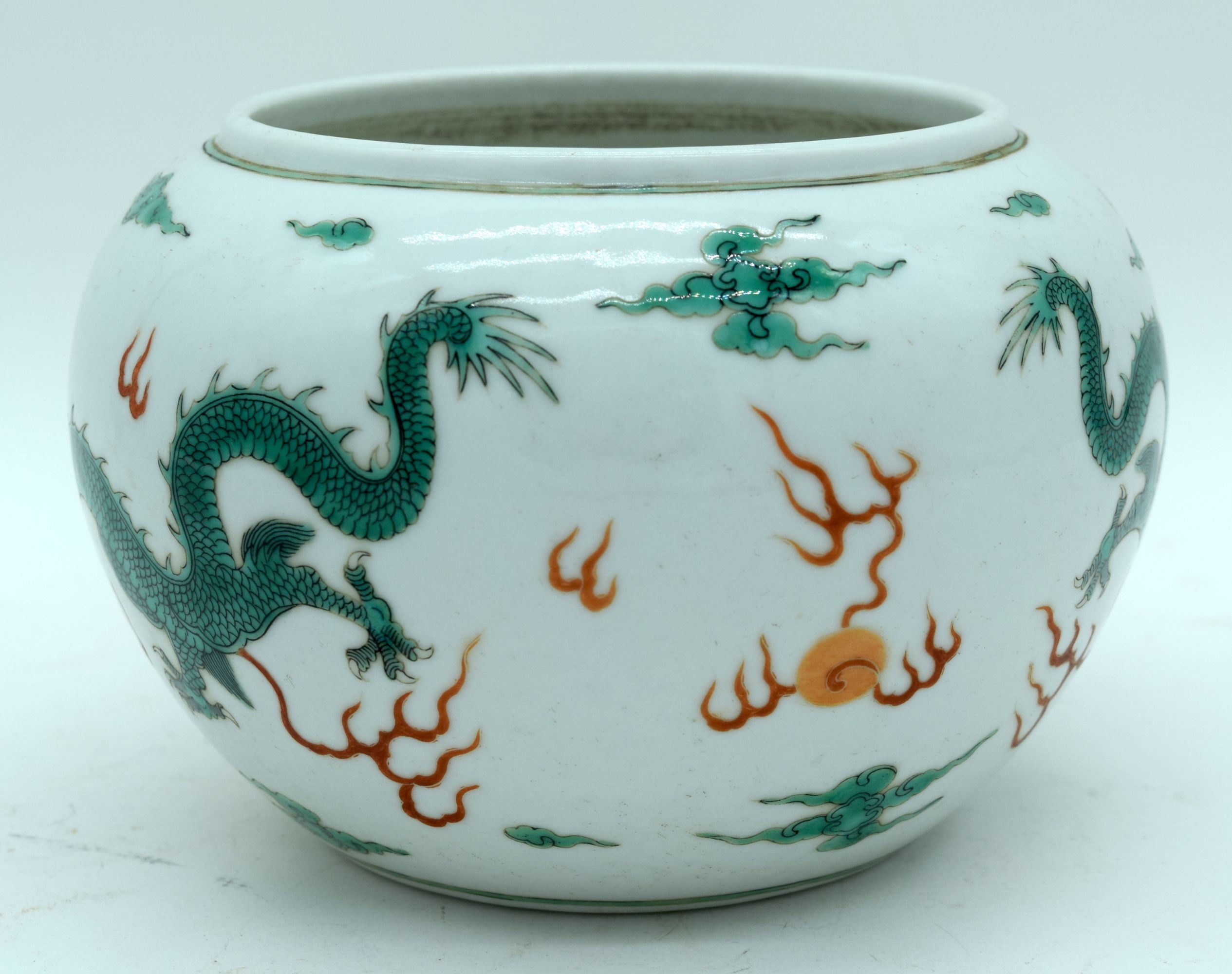 A Chinese porcelain bowl decorated with dragons and clouds. 12 x 17cm - Image 2 of 5