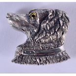 A STERLING SILVER DOG BROOCH. 3cm x 3cm