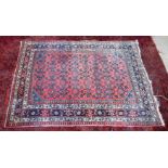 A Persian rug 199 x 144 cm.