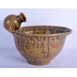AN UNUSUAL STUDIO POTTERY STONEWARE BOWL unusually modelled with an overlaid amphora. 21 cm x 27 cm.