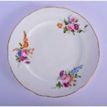Nantgarw plate c.1818-20, painted with small arrangements of colourful British flowers reserved on a