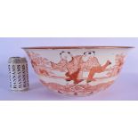 A RARE LARGE 19TH CENTURY JAPANESE MEIJI PERIOD KUTANI PORCELAIN BOWL painted with figures in variou