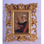 AN ANTIQUE EUROPEAN PORCELAIN PLAQUE within a florentine frame. Porcelain 12.5 cm x 8.5 cm.