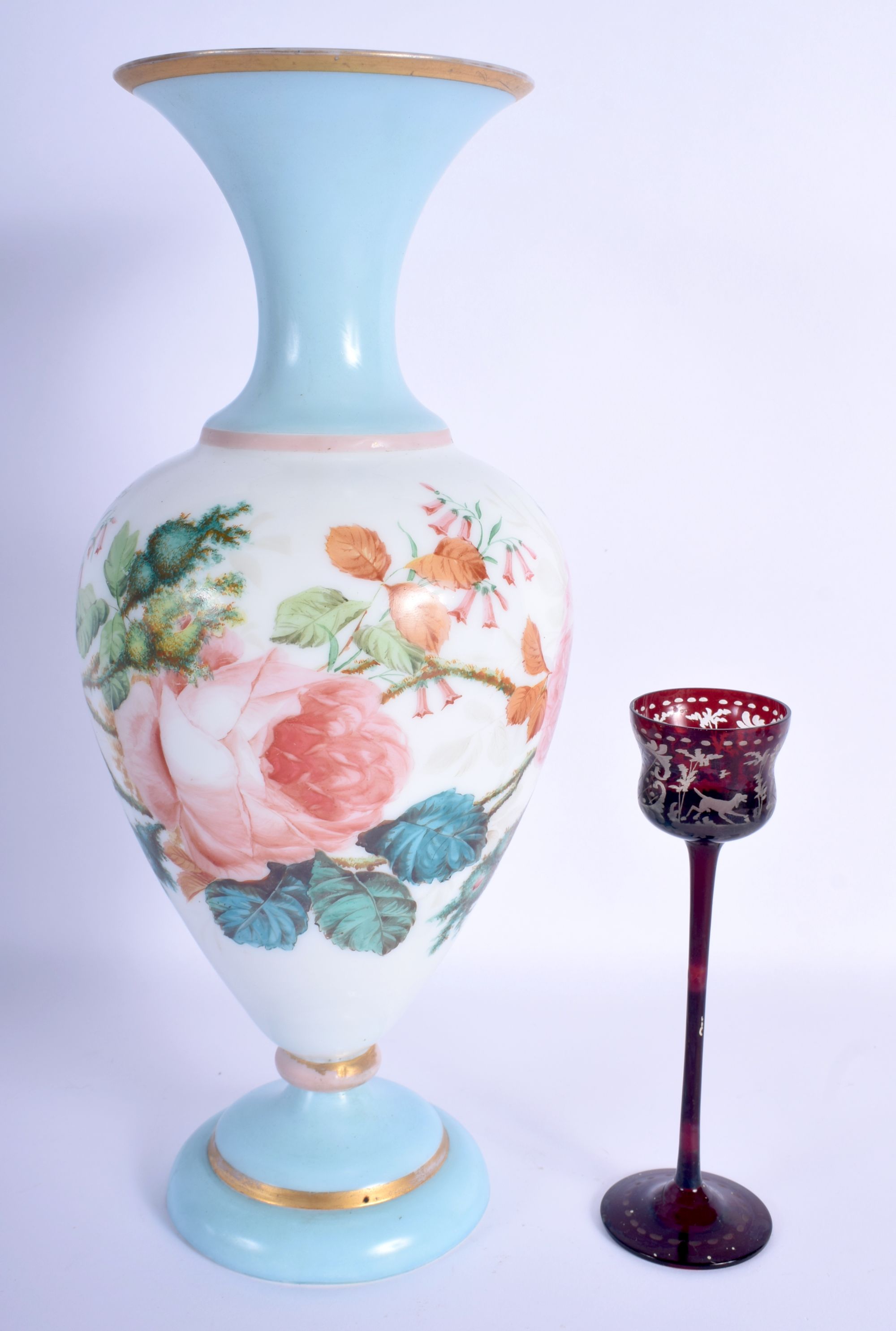 A LARGE EARLY 20TH CENTURY BOHEMIAN ENAMELLED OPALINE GLASS VASE and a small deer cup. Largest 33 cm