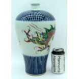 A Chinese porcelain polychrome Meiping vase decorated with a dragon. 33cm