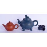 AN EARLY 20TH CENTURY CHINESE YIXING POTTERY TEAPOT AND COVER Late Qing/Republic, together with anot