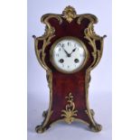 AN ART NOUVEAU FRENCH IMITATION TORTOISESHELL MANTEL CLOCK of scrolling form. 33 cm x 14 cm.