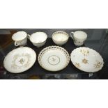 AN ANTIQUE MINTON TRIO together with two other similar cups and saucers. (7)