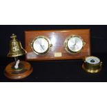A mounted clock and barometer set together with a desk bell and barometer largest 48 x 22cm (4)