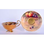 A ROYAL WORCESTER PEDESTAL CUP AND SAUCER painted by Price. Saucer 12 cm diameter. (2)