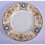 Late 19th c. Minton fine plate with pate sur pate classical busts on a light yellow ground, gold glo