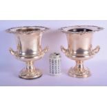 A PAIR OF VINTAGE TWIN HANDLED SILVER PLATED WINE COOLERS with acanthus capped banding. 25 cm x 20 c
