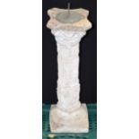 A stone composite Sun Dial on a column 78 x 22cm .