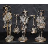 A group of three bronze South East Asian figures of males 25cm. (3)