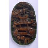 A CONTEMPORARY JADE PENDANT CARVED WITH A PAGODA ON A LAKE. 9cm long, 5.5cm wide