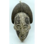 An African Igbo style Tribal mask 50 x 26cm.