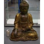 A LARGE CHINESE TIBETAN BRONZE FIGURE OF A SEATED BUDDHA 20th Century, modelled in floral capped rob