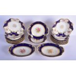 AN ANTIQUE COALPORT PART DESSERT SERVICE decorated with foliage and seaweed scrolls. Largest 28 cm w