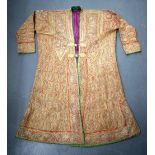 AN EARLY 20TH CENTURY INDIAN EMBROIDERED GOLD SILK JACKET decorated with foliage. 100 cm x 125 cm.