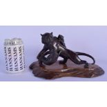 A 19TH CENTURY JAPANESE MEIJI PERIOD BRONZE FIGURE OF A TIGER OKIMONO modelled being attacked. Bronz