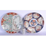 A MATCHED PAIR OF 19TH CENTURY JAPANESE MEIJI PERIOD IMARI CHARGERS painted with birds and foliage.