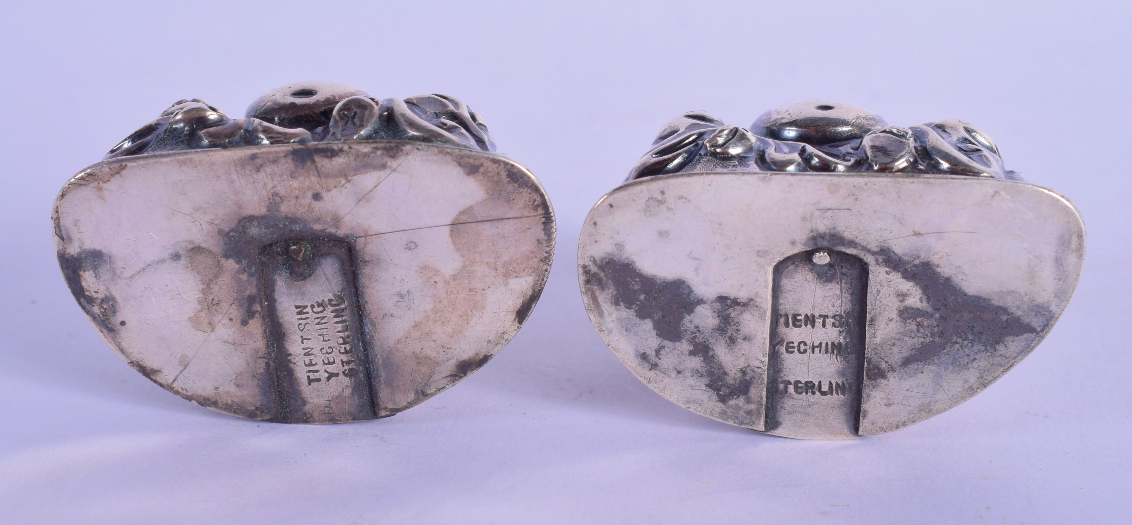 A PAIR OF CHINESE SILVER CONDIMENTS IN THE FORM OF BUDDHA. 4cm x 4.5cm x 2.5cm, weight 43g - Image 3 of 4