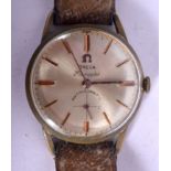 A VINTAGE OMEGA SEAMASTER GOLD PLATED WRISTWATCH with leather strap. 4 cm diameter.