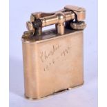 AN ART DECO 9CT GOLD DUNHILL LIGHTER. 39 grams overall. 4.5 cm x 3.5 cm.