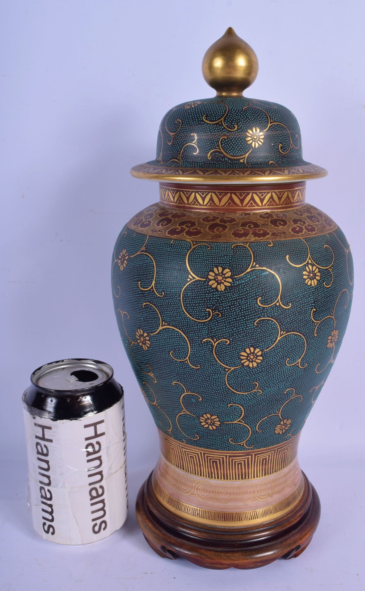 A 19TH CENTURY JAPANESE MEIJI PERIOD OVER ENAMELLED PORCELAIN VASE AND COVER painted with foliage. 3
