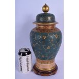 A 19TH CENTURY JAPANESE MEIJI PERIOD OVER ENAMELLED PORCELAIN VASE AND COVER painted with foliage. 3