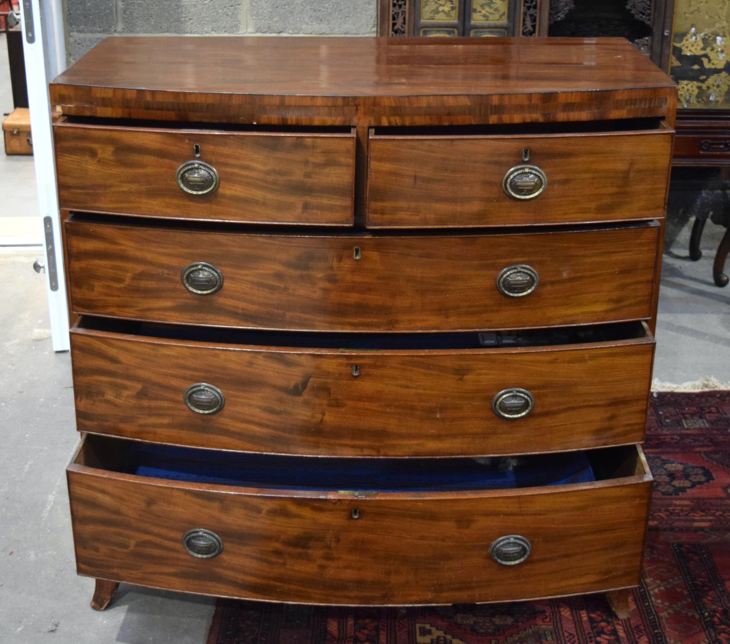 A GEORGE III BOW FRONTED VENEERED FIVE DRAWER CHEST OF DRAWERS. 107 x 107 x 57 cm. - Image 2 of 3